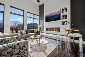 Smart TV, fireplace, foosball, books