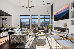 Smart TV, fireplace, foosball, books