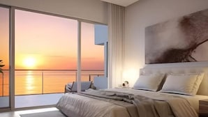 A modern bedroom with a large bed, a view of the sunset, and a painting on the wall. - Linghai Seaview Apartment (Huizhou Huidong Shili Yintan Shop) (Huidong)