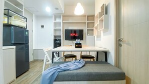 Standard Apartment, 1 Bedroom (Apartment) | Living room - Comfy and Homey 2BR at Tokyo Riverside PIK 2 Apartment (Teluknaga)