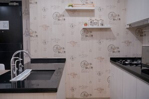 Private kitchen - Warm and Spacious 1BR at Branz BSD City Apartment (Pagedangan)