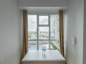 Standard Studio, 1 Bedroom (Apartment) - Tiny Studio with Pool View at Taman Melati Surabaya Apartment (Surabaya)