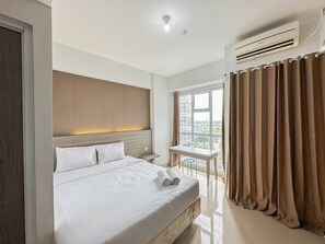 Standard Studio, 1 Bedroom (Apartment) - Tiny Studio with Pool View at Taman Melati Surabaya Apartment (Surabaya)