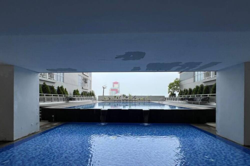 Tiny Studio with Pool View at Taman Melati Surabaya Apartment