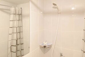 Standard Studio, 1 Bedroom (Apartment) | Bathroom - Cozy Studio at 37th Floor Tokyo Riverside PIK 2 Apartment (Teluknaga)