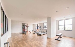 Work out in style with a variety of exercise equipment and large windows offering a view.