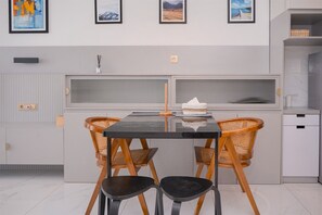 Dining room - Spacious & Elegant 3BR Apartment at Sky House BSD (Pagedangan)