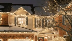 A house with a garage, a front door, and a snow-covered driveway. - Private Studio- Cozy, Comfort,Convenience (Milton)