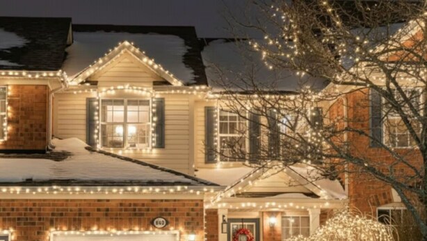 A house with a garage, a front door, and a snow-covered driveway. - Private Studio- Cozy, Comfort,Convenience (Milton)