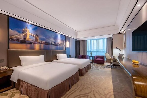 A hotel room with two beds, a desk, a chair, a TV, and a large window. - Hangzhou Yuecheng Audio & Video International Hotel (Boao Xinhan Road Subway Station) (Hangzhou)