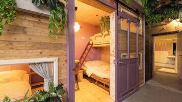 Deluxe Quadruple Room, Mobility Accessible | Free WiFi, bed sheets