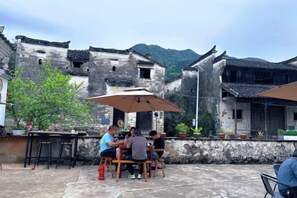 Unclassified image, 4 of 62, button - Xiaotaoyuan Inn (Wuyuan)