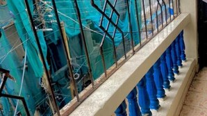 A staircase with a metal railing and blue steps. - Bondeni Mombasa city (Mombasa)
