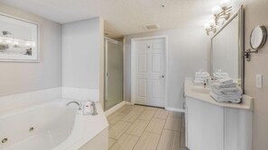 Shower, jetted tub, hair dryer, towels