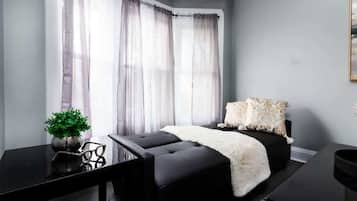 1 dormitorio, tabla de planchar con plancha, cuna de viaje y wifi