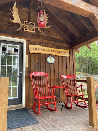 Exterior detail. White Pine Acres Cozy couples cabin in lanark private on a large pond & pines