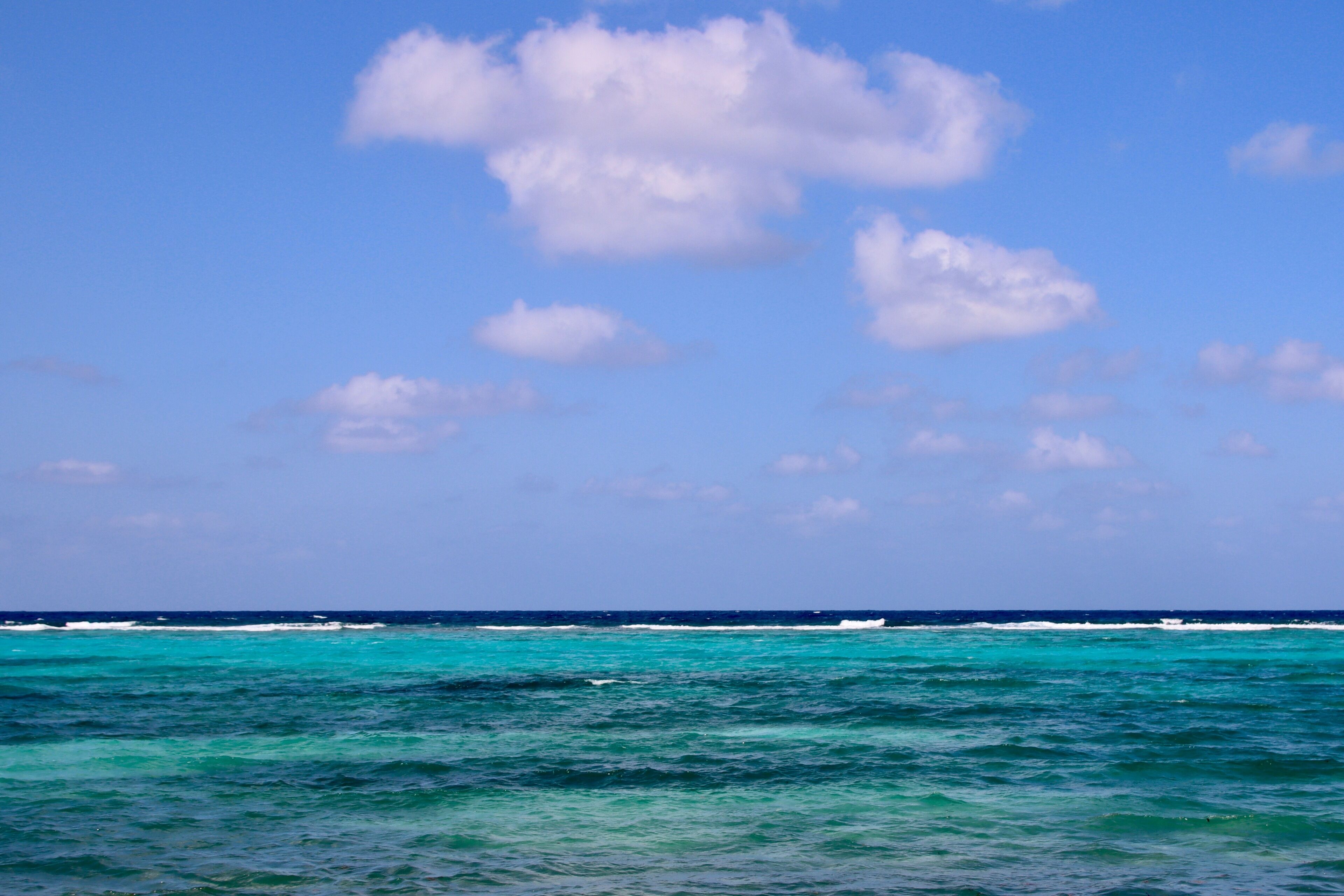 On the beach, sun loungers, beach towels