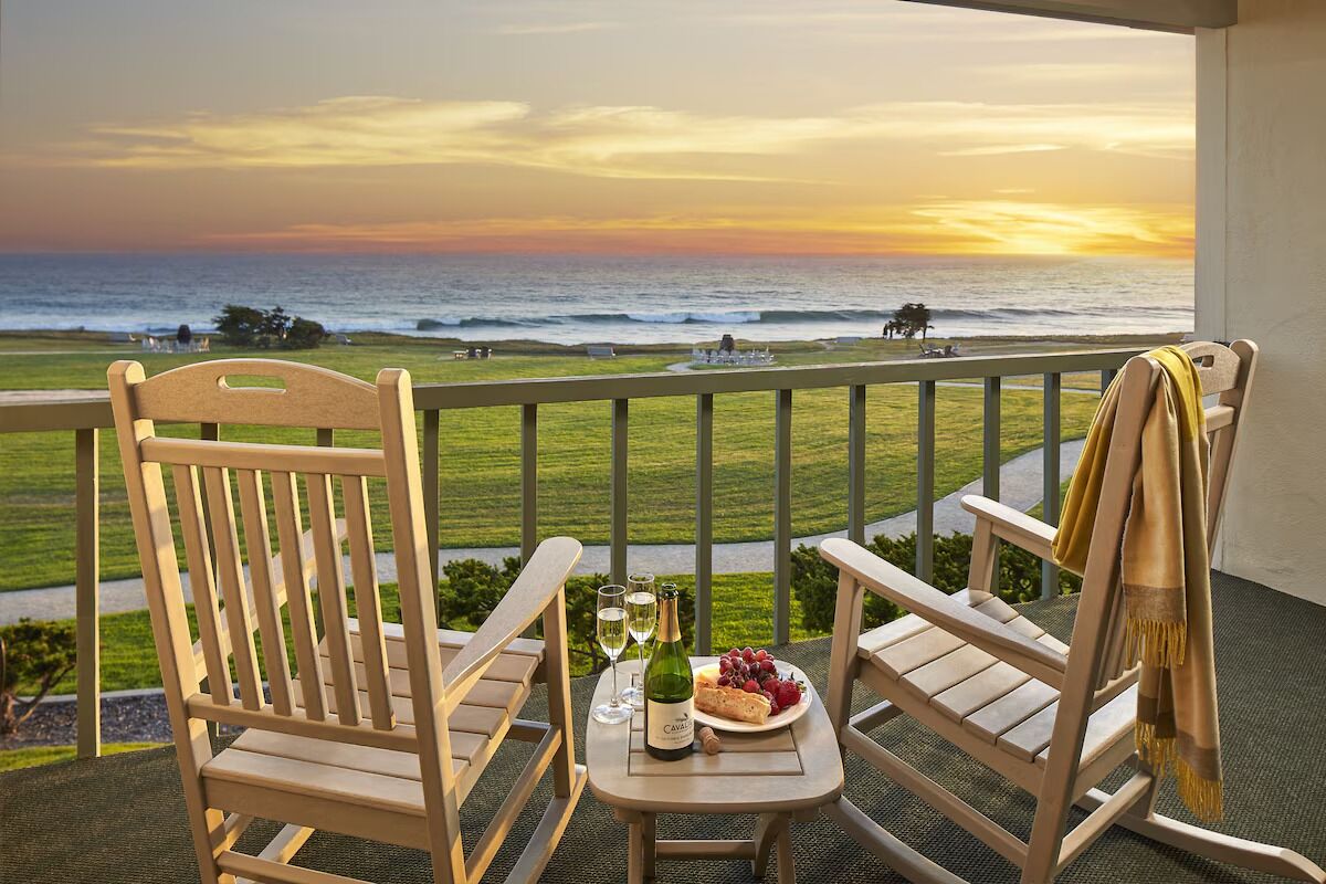 Toast golden sunsets from your private balcony overlooking the ocean.