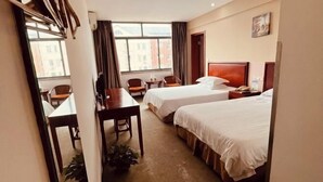 A hotel room with two beds, a desk, chairs, a window, and a door. - Green Tree Alliance Hotel (Shanghai East Jinxiu Road) (Shanghai)