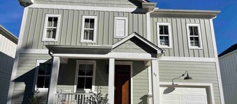 Spacious 5-bed/5 bath home with river view.