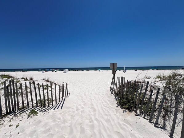 On the beach, sun-loungers