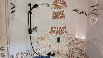 Hair dryer, towels, soap, shampoo