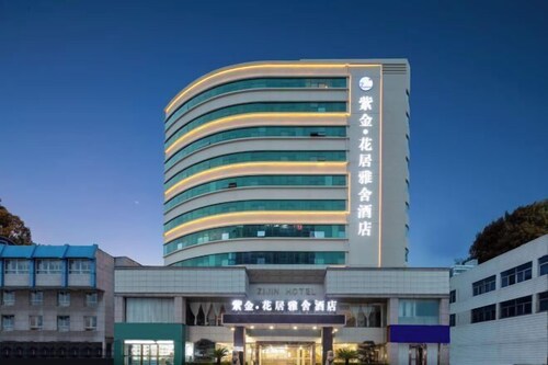 Zijin HuaJiYaShe Hotel (Changxing Dongyufang Jiuhuicheng)
