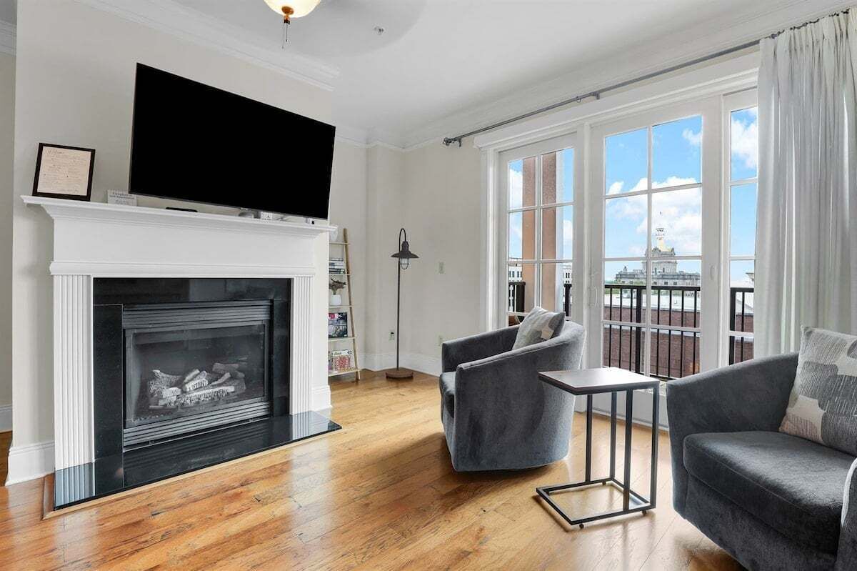 Enjoy our decorate fireplace and wall mounted smart tv during a cozy night in watching movies with family and friends or catch up on your favorite sporting events during your stay.