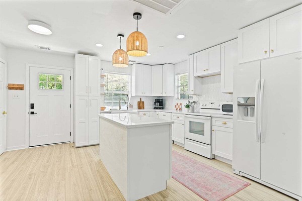 This spacious kitchen is ready for whatever you're cooking up—whether it's a homemade feast or just another round of snacks and wine.