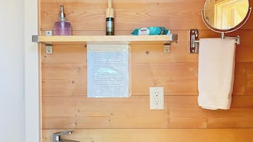 Shower, hair dryer, towels, toilet paper