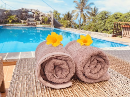 Outdoor pool, pool umbrellas, sun loungers