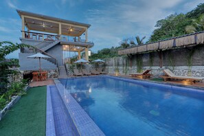 Outdoor pool, pool umbrellas, pool loungers