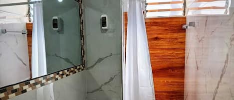 Shower, towels, toilet paper