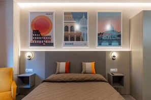 Relax in a stylish room with a large bed, two bedside tables, and iconic Rome landmarks above.