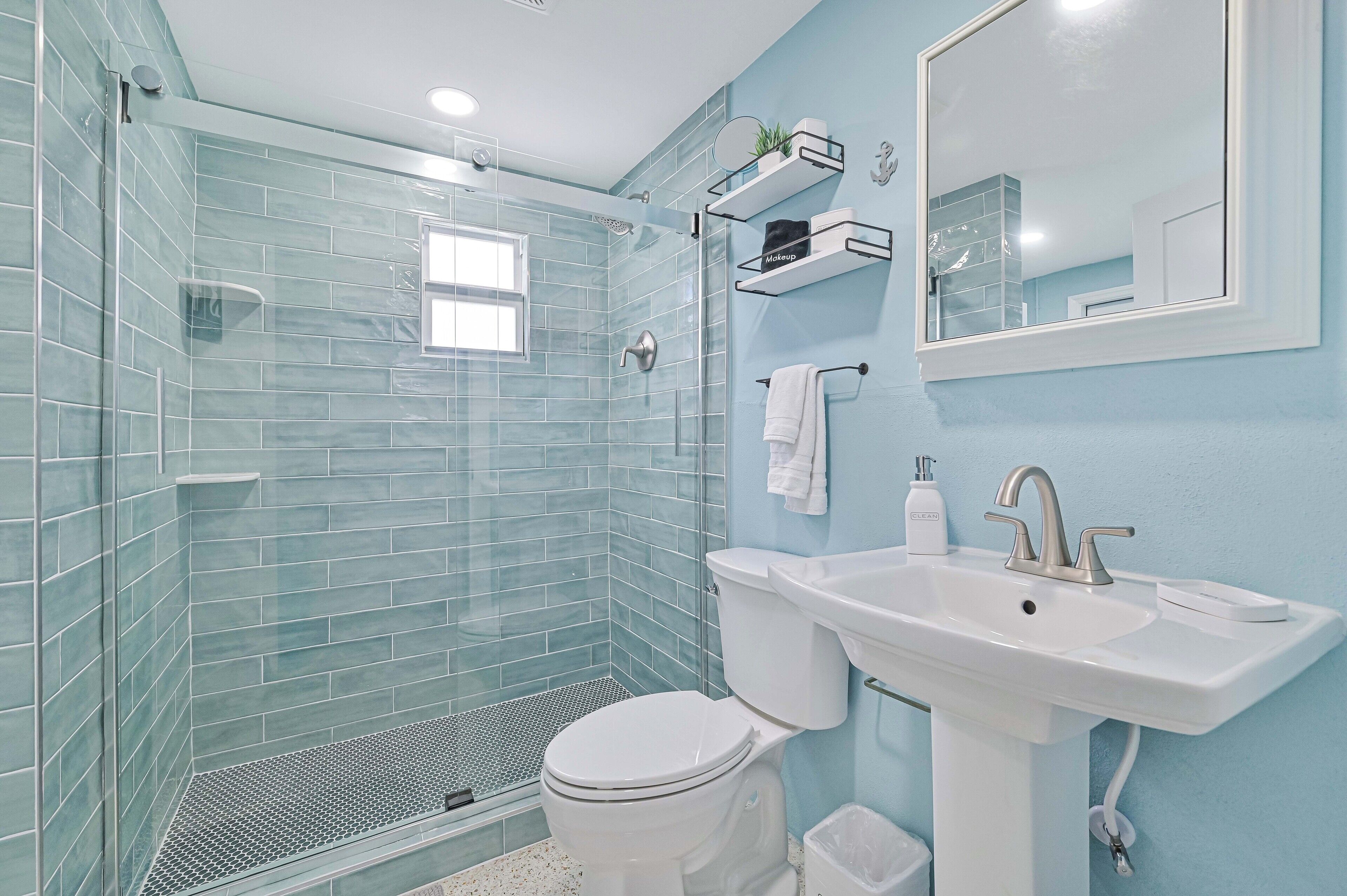 Shower, hair dryer, towels, soap