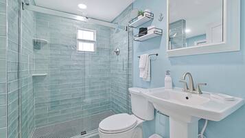 Shower, hair dryer, towels, soap