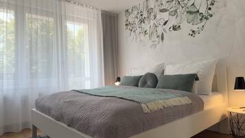 Familienapartment | 1 Schlafzimmer, Verdunkelungsvorhänge, Bügeleisen/Bügelbrett