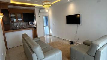 Departamento Deluxe, vista a la montaña | Área de sala de estar