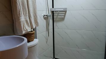 Shower, towels, soap, shampoo