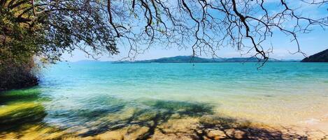 On the beach, beach umbrellas, beach massages, beach yoga