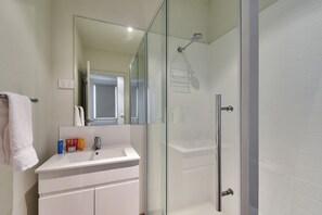 Shower, towels, soap, shampoo