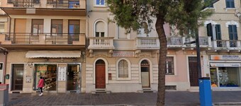 On the main street, just steps from the sea