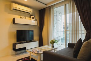 Deluxe-Suite, 1 Schlafzimmer | Wohnbereich