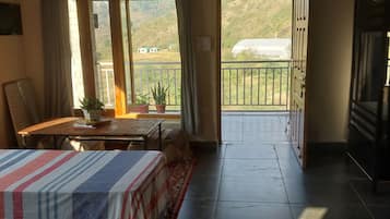 Deluxe Double Room, Hill View | Desk, soundproofing, free WiFi