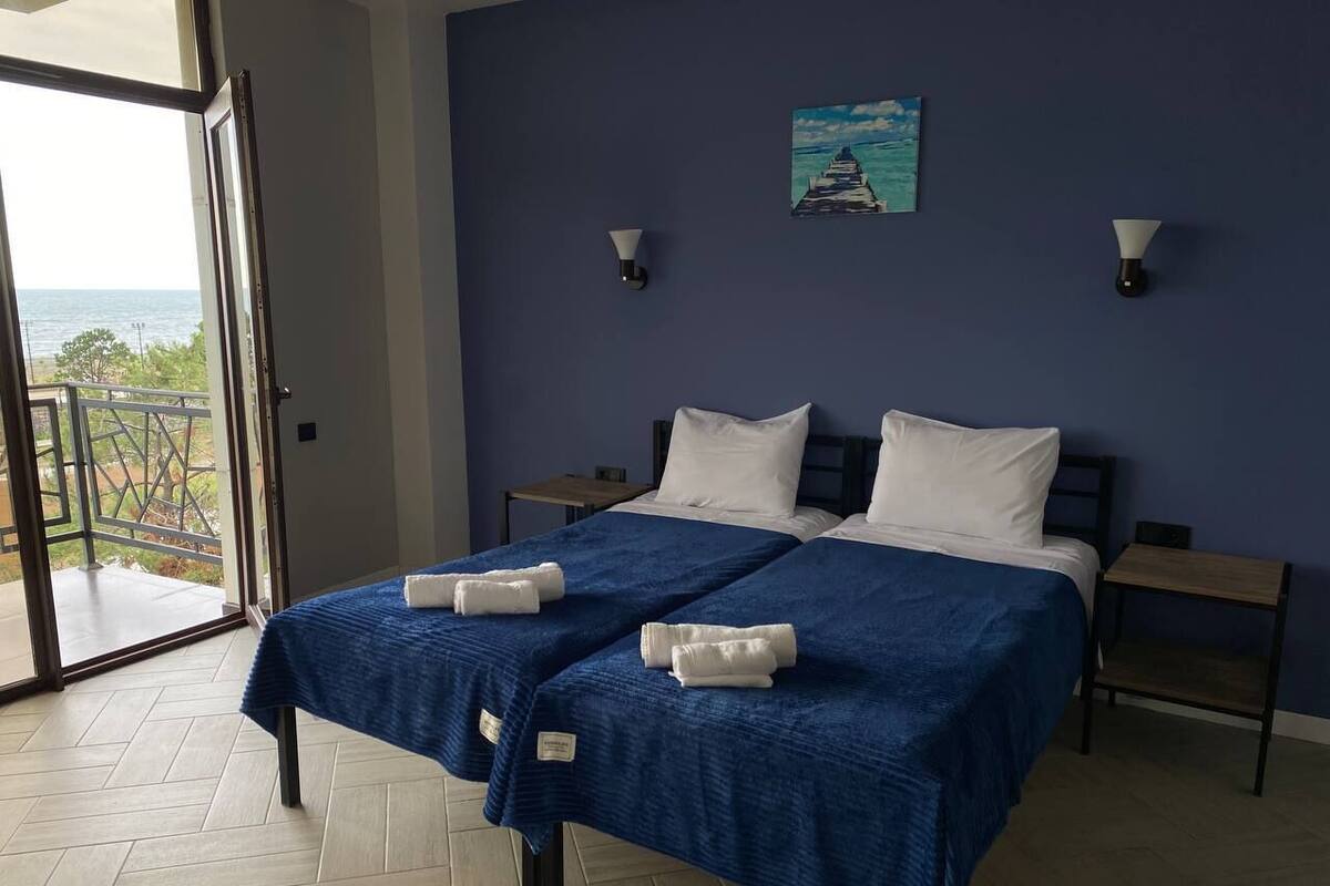 Deluxe Double or Twin Room, Sea View | In-room safe, desk, iron/ironing board, rollaway beds