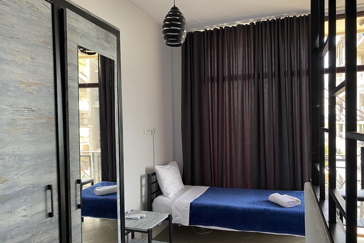 Superior Triple Room, Kitchen, Mountain View | In-room safe, desk, iron/ironing board, rollaway beds