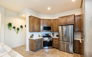 Dishwasher, coffee/tea maker, ice maker, dining tables