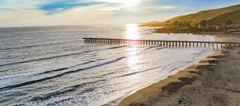 Walk to Pier + Beach | Stylish 2BR w/ Ocean View | Shared Bar, Firepit, Lounge
