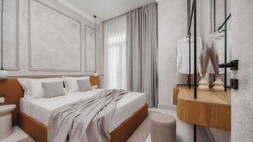 Premium bedding, down comforters, pillowtop beds, in-room safe