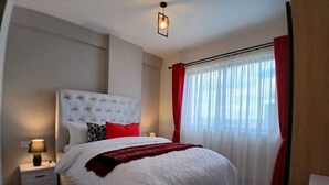 Departamento Deluxe, balcón, vista a la ciudad | 1 habitación, espacio para trabajar con laptop y wifi gratis 